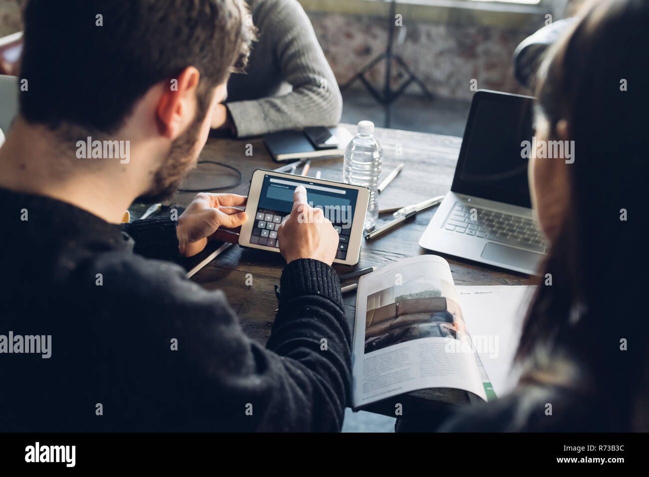 Designers brainstorming in studio Stock Photo