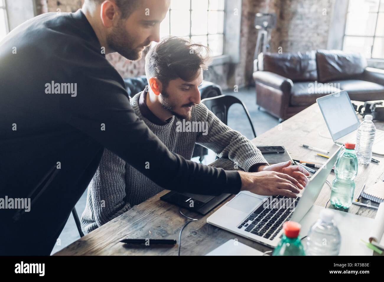 Designers brainstorming in studio Stock Photo