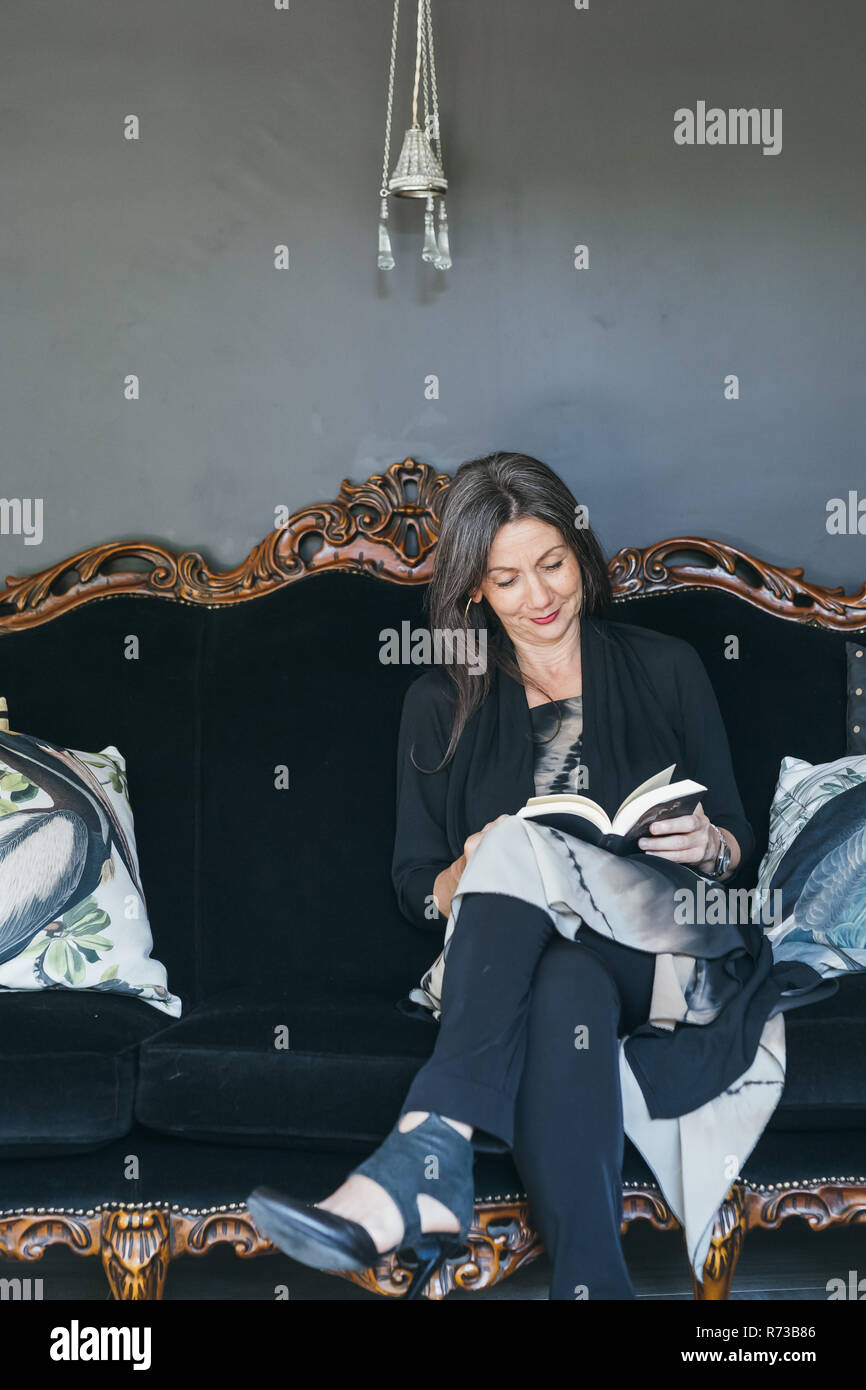 Old woman sitting alone sofa hi-res stock photography and images - Alamy