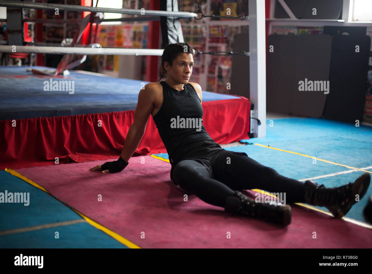 Female boxer resting in ring hi-res stock photography and images - Alamy