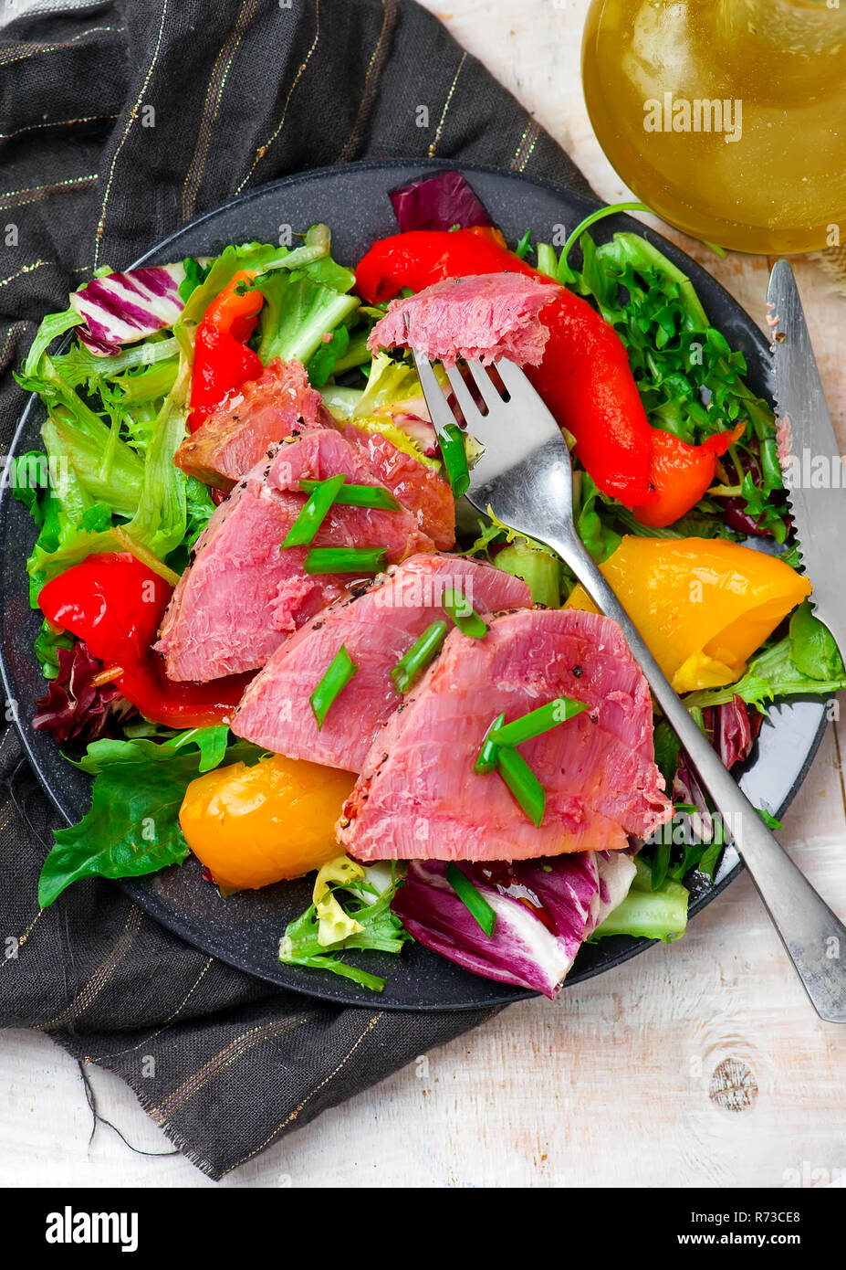 Seared Tuna Steaks with Greens. selective focus Stock Photo