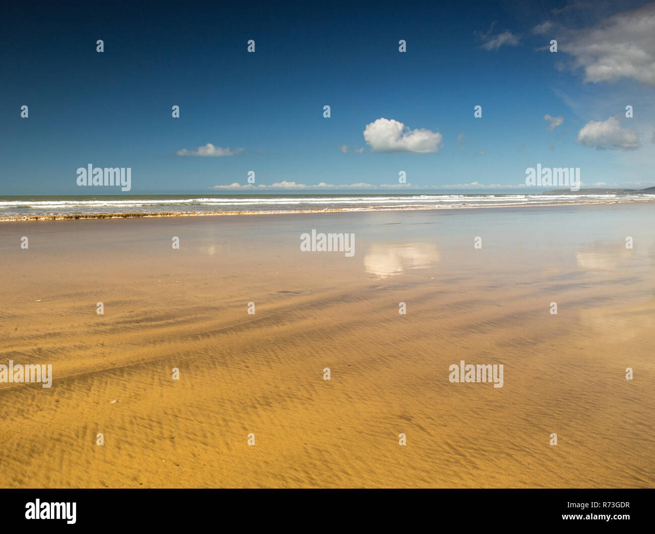 Beautiful beach reflections at Westward Ho! in North Devon , England Stock Photo