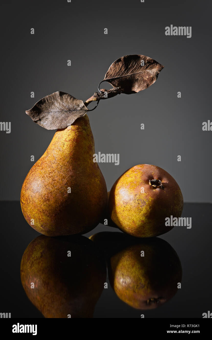 pears in front of dark background Stock Photo