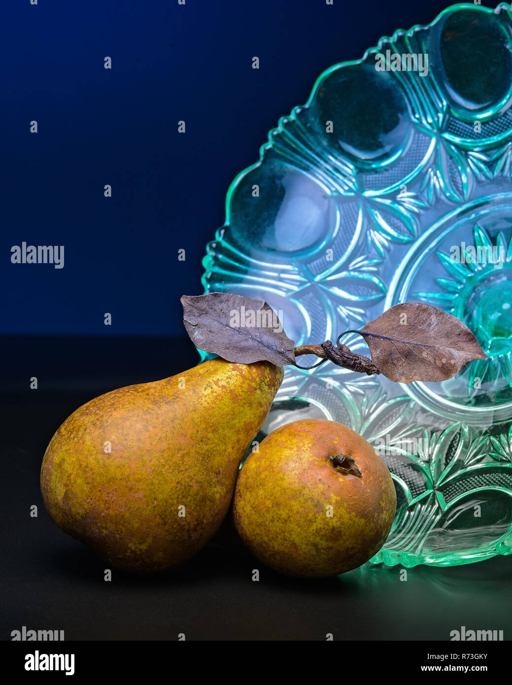 Pears and fruit container Stock Photo
