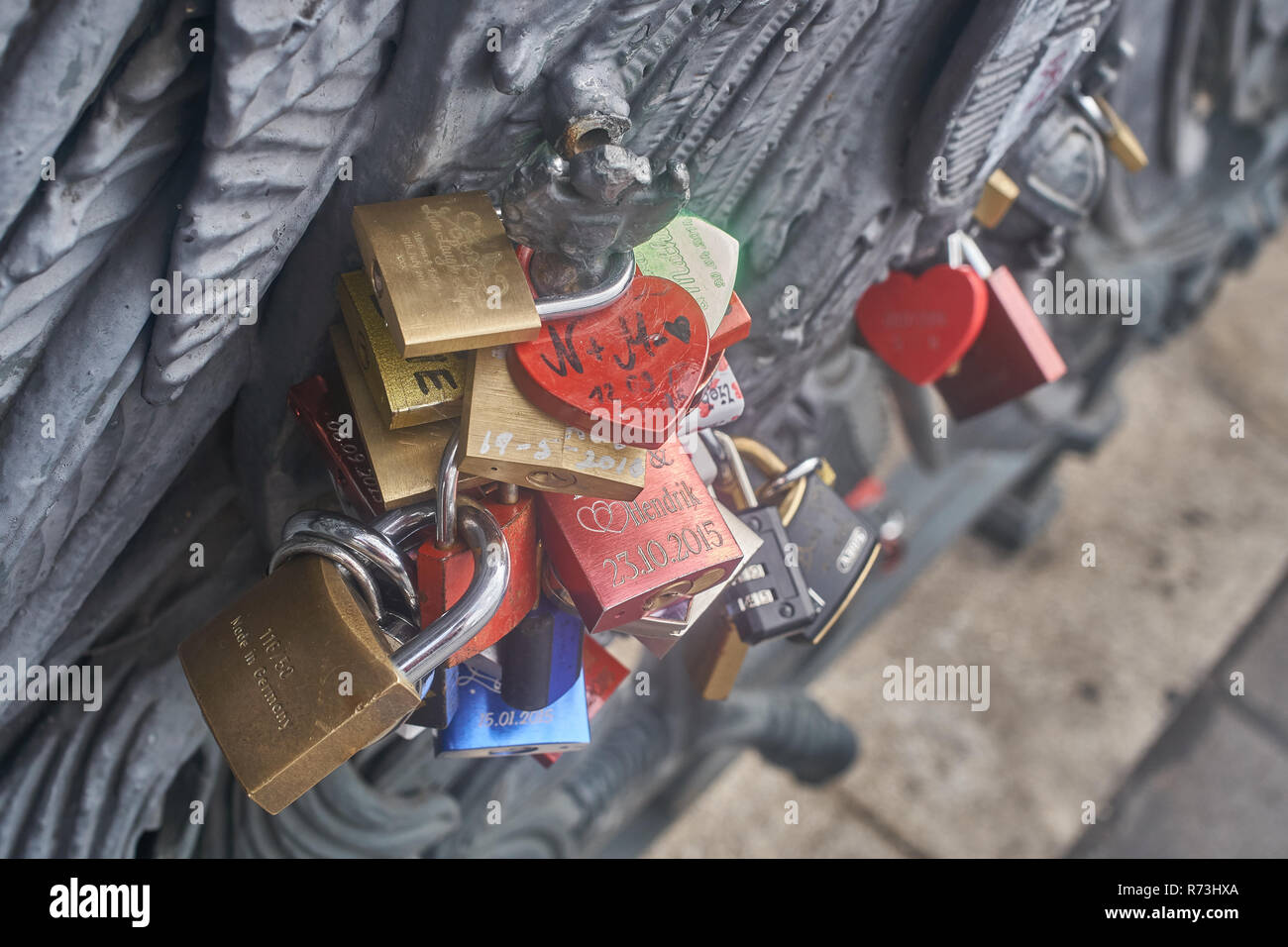Close up of locks on a bridge that people put as a symbol of love Stock