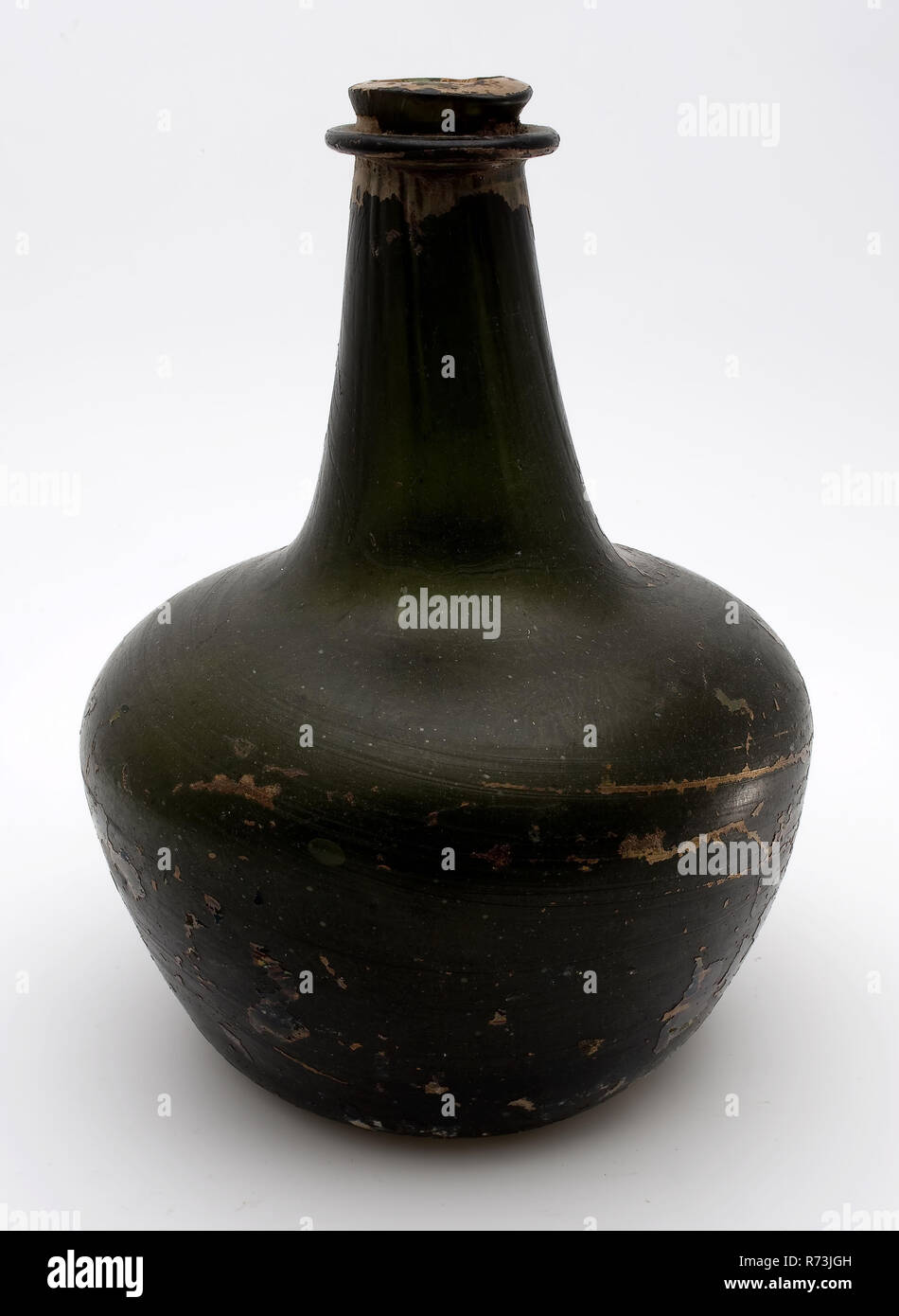 Belly bottle shaft and globe belly bottle bottle holder soil find glass free blown and shaped glass application Circular thick walled bottle in clear green glass english shaft and globe model Pontil m...