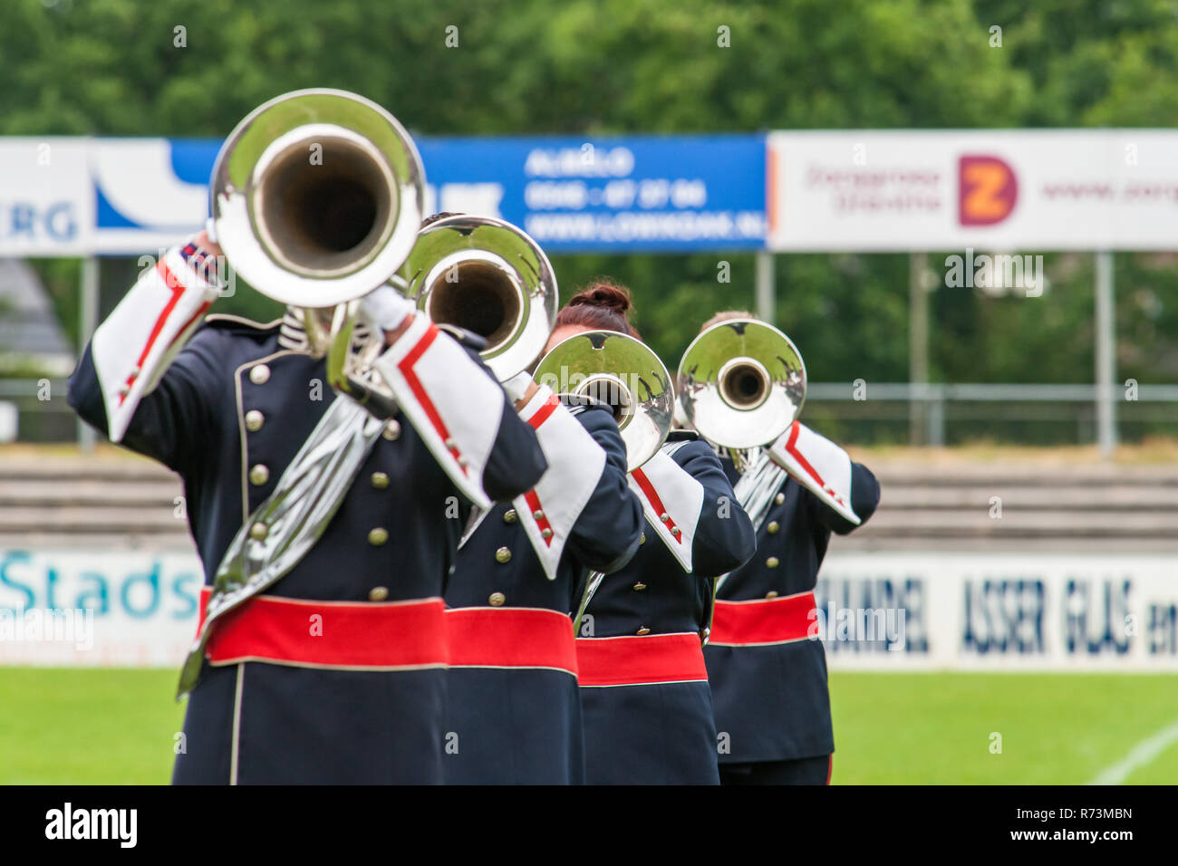 Details from a music, show and marching band. Playing musicians wind