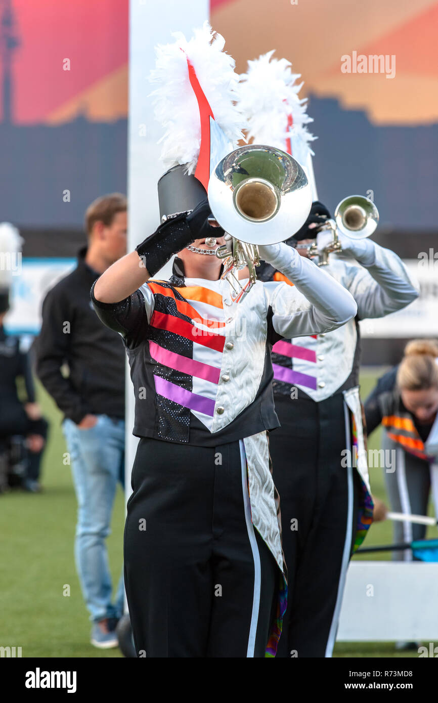 Details from a music, show and marching band. Playing musicians wind