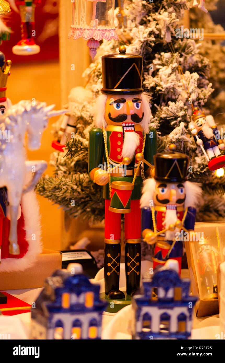 Christmas market, Traditional Christmas holiday nutcrackers figurine ornament. Wooden nutcracker, kings, soldiers and gendarmes Stock Photo