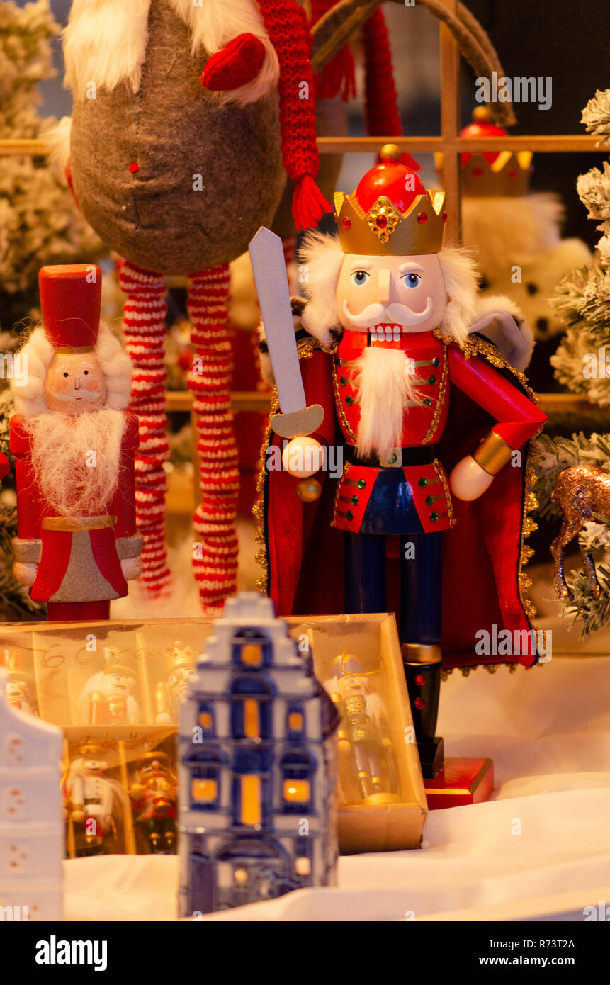 Christmas market, Traditional Christmas holiday nutcrackers figurine ornament. Wooden nutcracker, kings, soldiers and gendarmes Stock Photo
