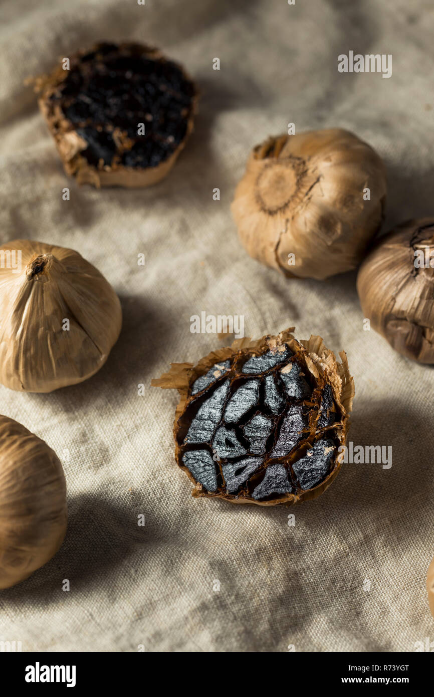 Organic Fermented Black Garlic Ready to Cook With Stock Photo