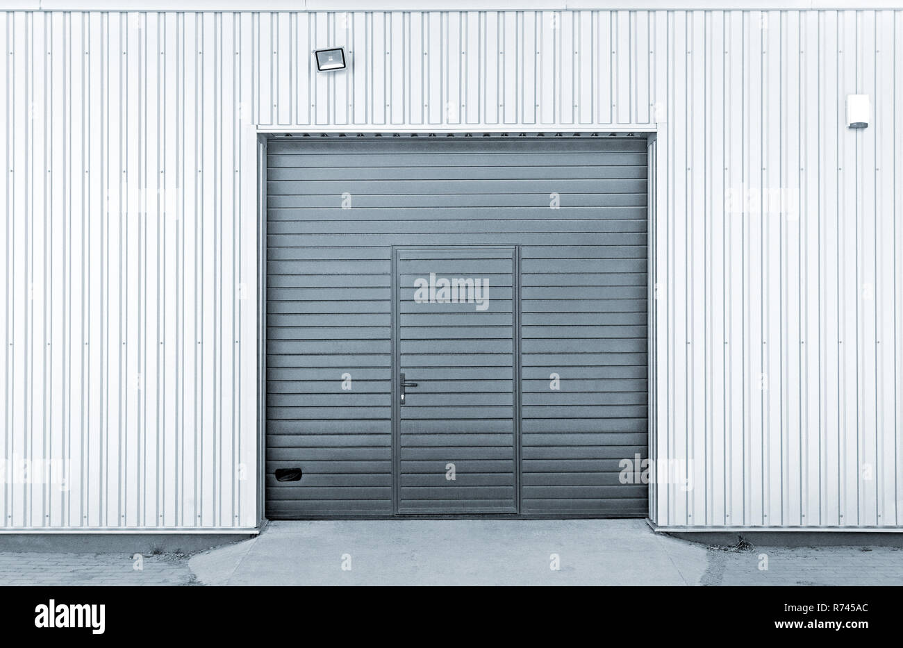 Closed modern garage or warehouse doors Stock Photo Alamy