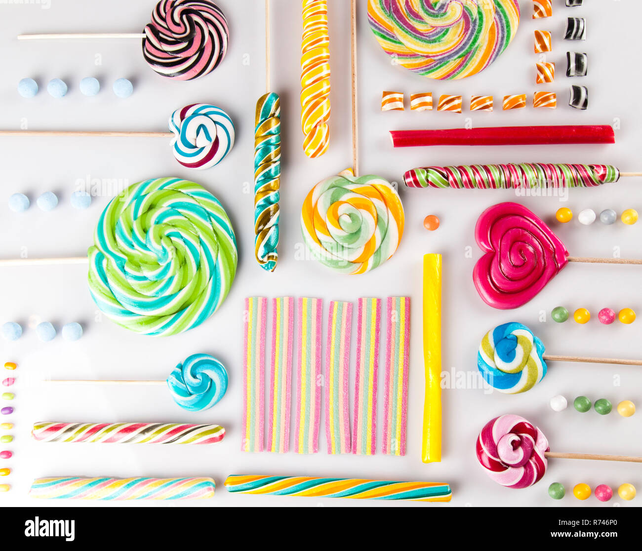 Small Objects Candy Assorted candies including lollipops, gum balls Stock Photo - Alamy