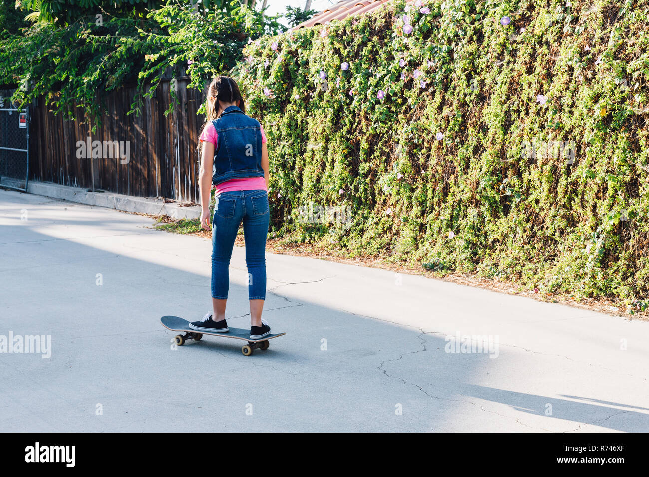 Girl on skateboard Stock Photo