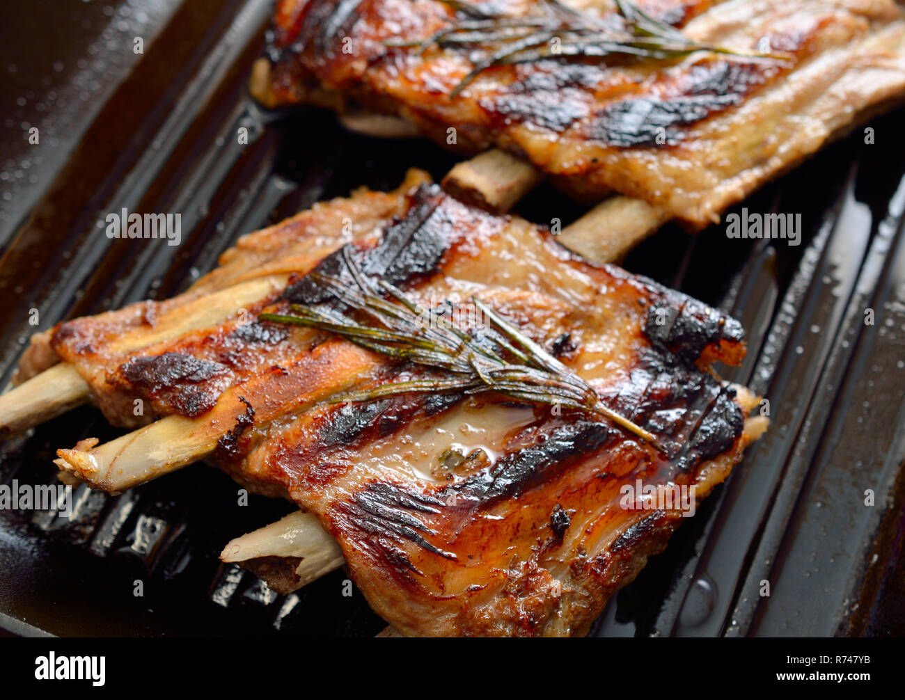 Pork Ribs On A Grill Frying Pan Stock Photo Alamy