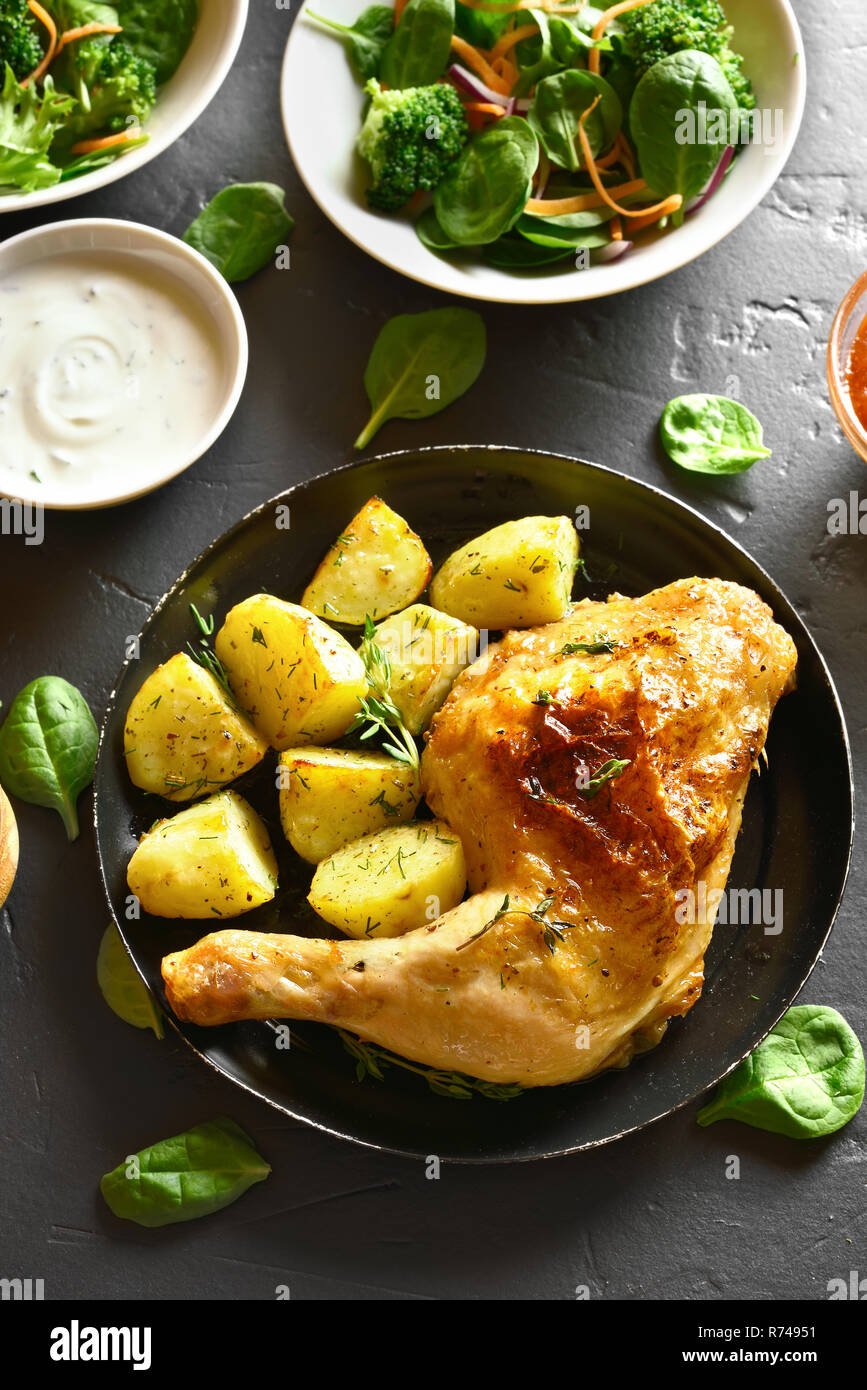 Grilled chicken leg with potato. Tasty dish for dinner Stock Photo Alamy