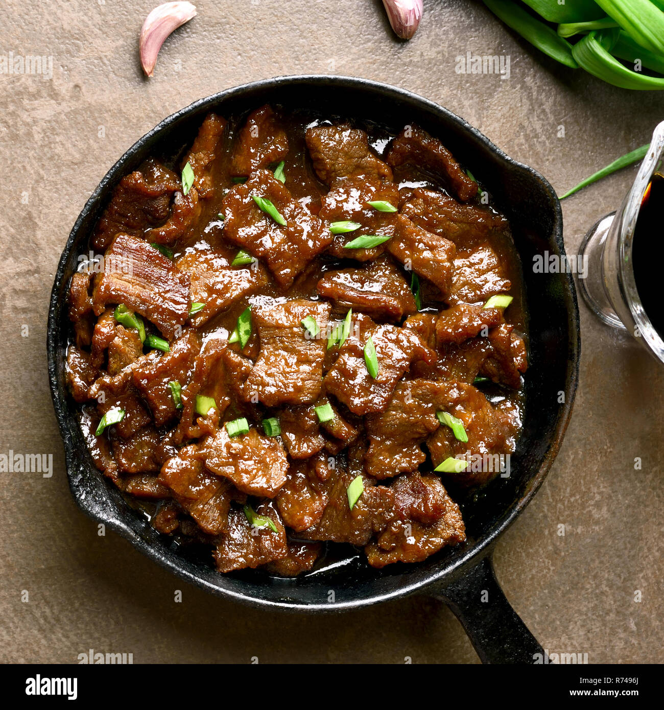 Close up of pieces of beef stewed in soy sauce with spices in asian style. Top view,flat lay Stock Photo