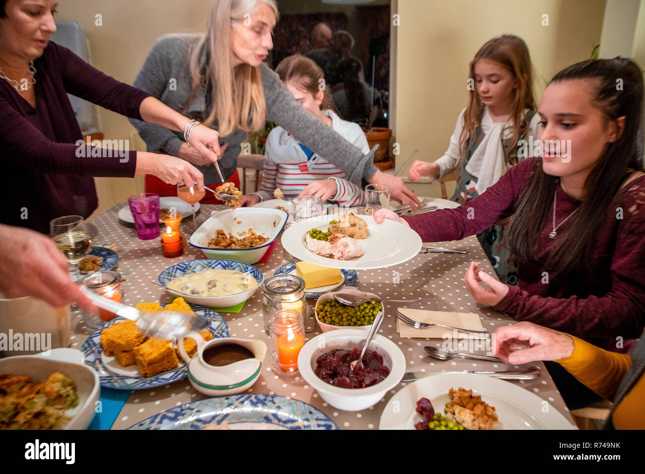 Serving Dinner at Thanksgiving Stock Photo Alamy