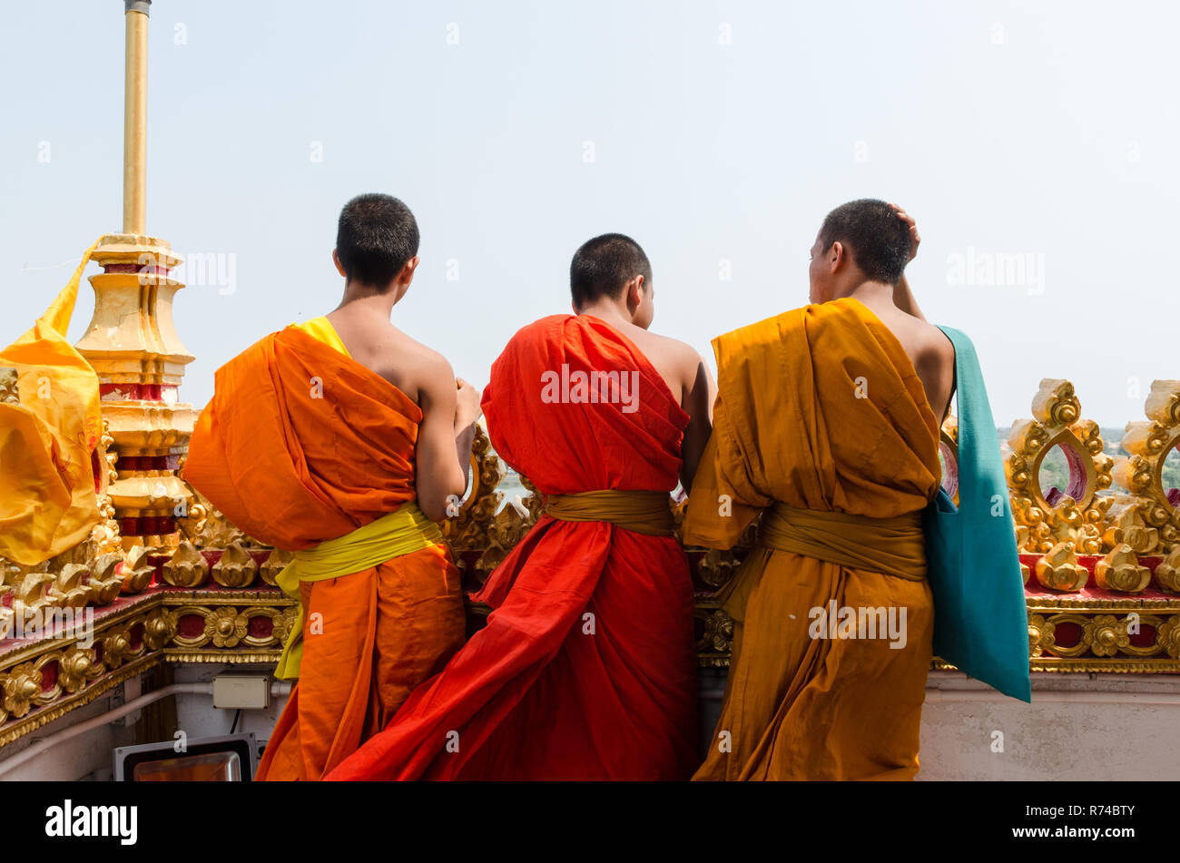 Three Buddhist monks in Wat Nong Wang, Khon Kaen, Thailand Stock Photo