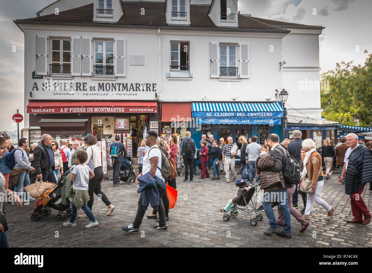 Paris, France - October 6, 2018: street atmosphere on the famous Place du Tertre in Montmartre where artists exhibit their work for curious passers-by Stock Photo