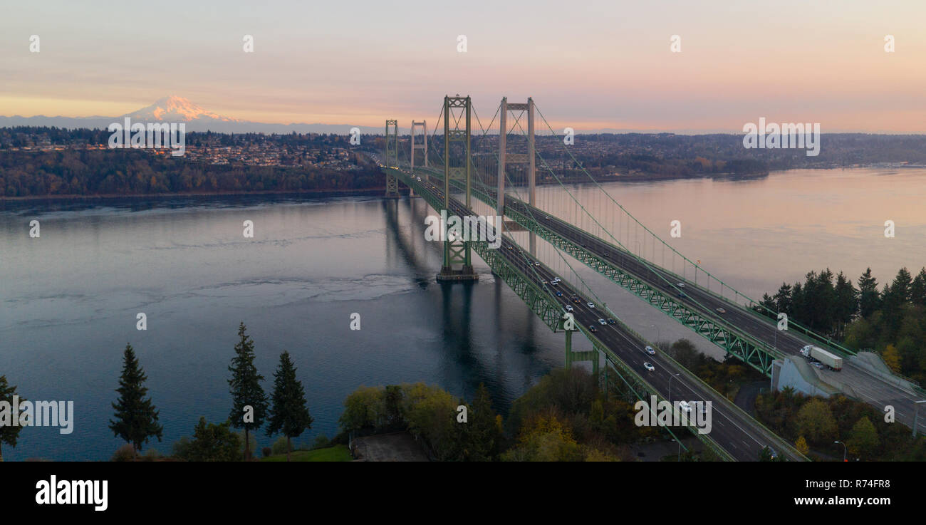 Traffic makes way across the bridge over Puget Sound in Washington State between Tacoma and Gig Harbor Stock Photo