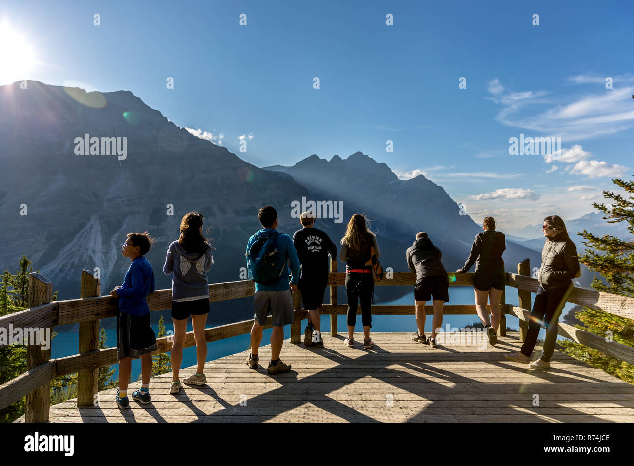 Banff, Canada - Sep 13th 2018 - Group of young people in an outlook at the Peyto Lake in a late afternoon light in Canada Stock Photo