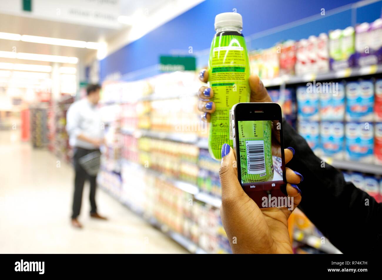 Shopping using a smart phone to scan barcodes of consumer goods in a