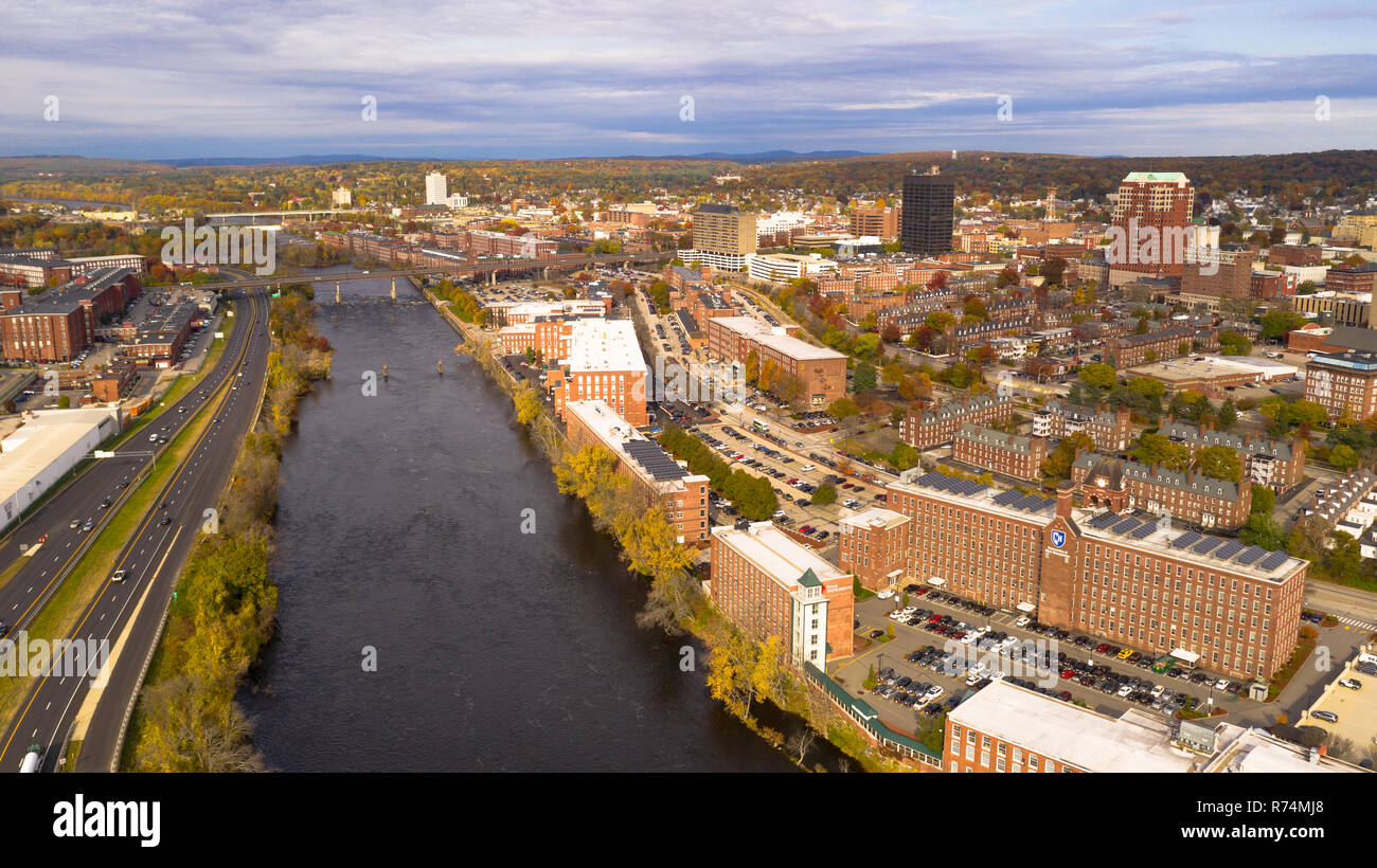 The highway runs next to the Merrimack River in the downtown urban core of Manchester New Hampshire Stock Photo