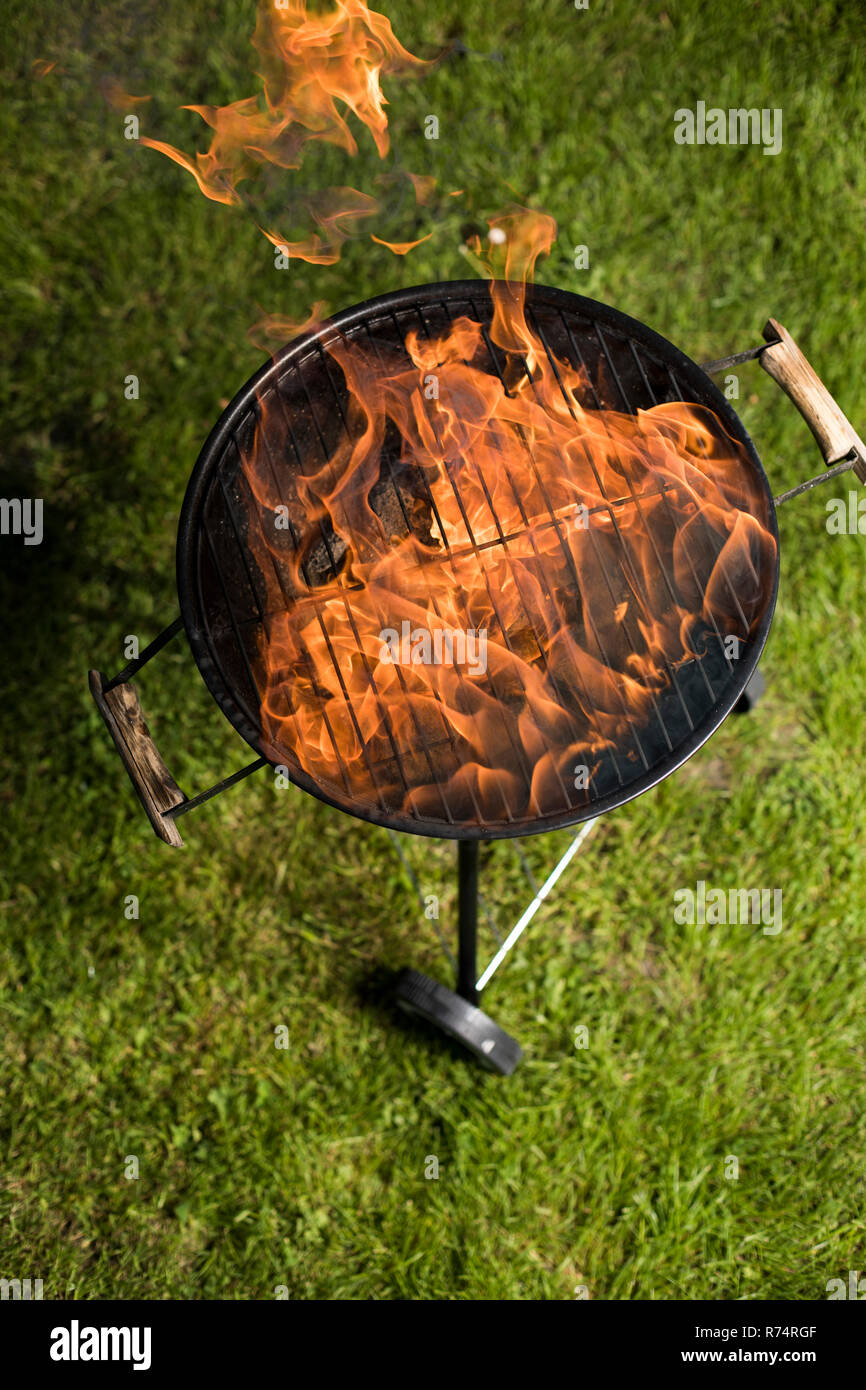 Grill on the garden, barbecue and fire background Stock Photo - Alamy