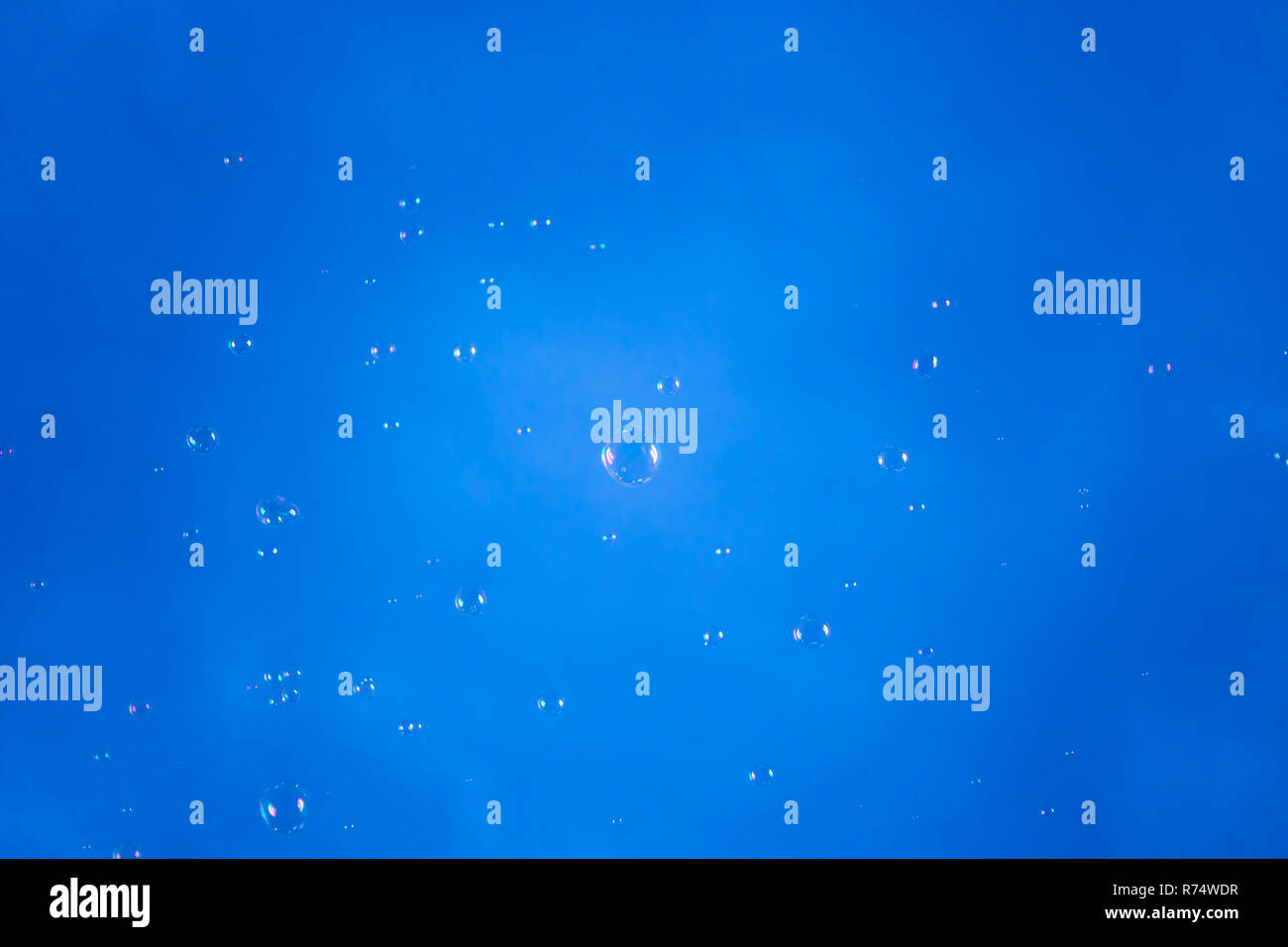 Soap bubbles floating in the air with blue sky in the background Stock ...