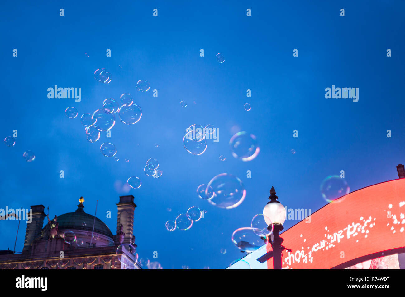 Soap bubbles floating in the air with blue sky in the background Stock ...