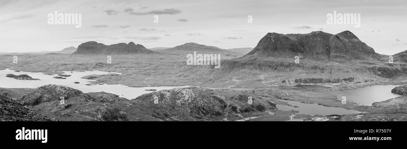 View of Suilven, Cul Mor and Canisp from Stac Pollaidh mountain in the far north west of Scotland, Highlands - panorama Stock Photo