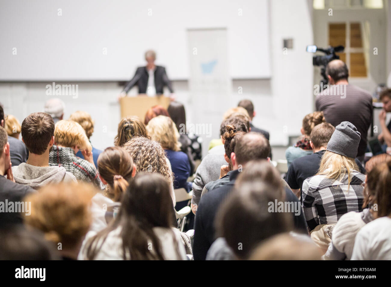 Business speaker giving a talk at business conference event. Stock Photo