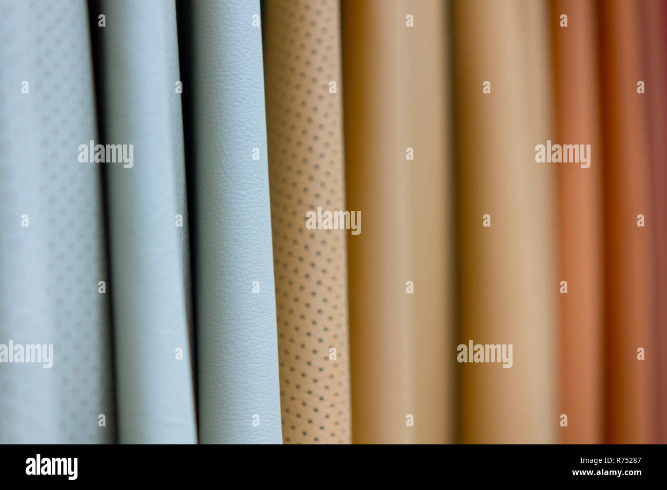 Crafting tools on natural cow leather in the tailoring workshop. Stock Photo