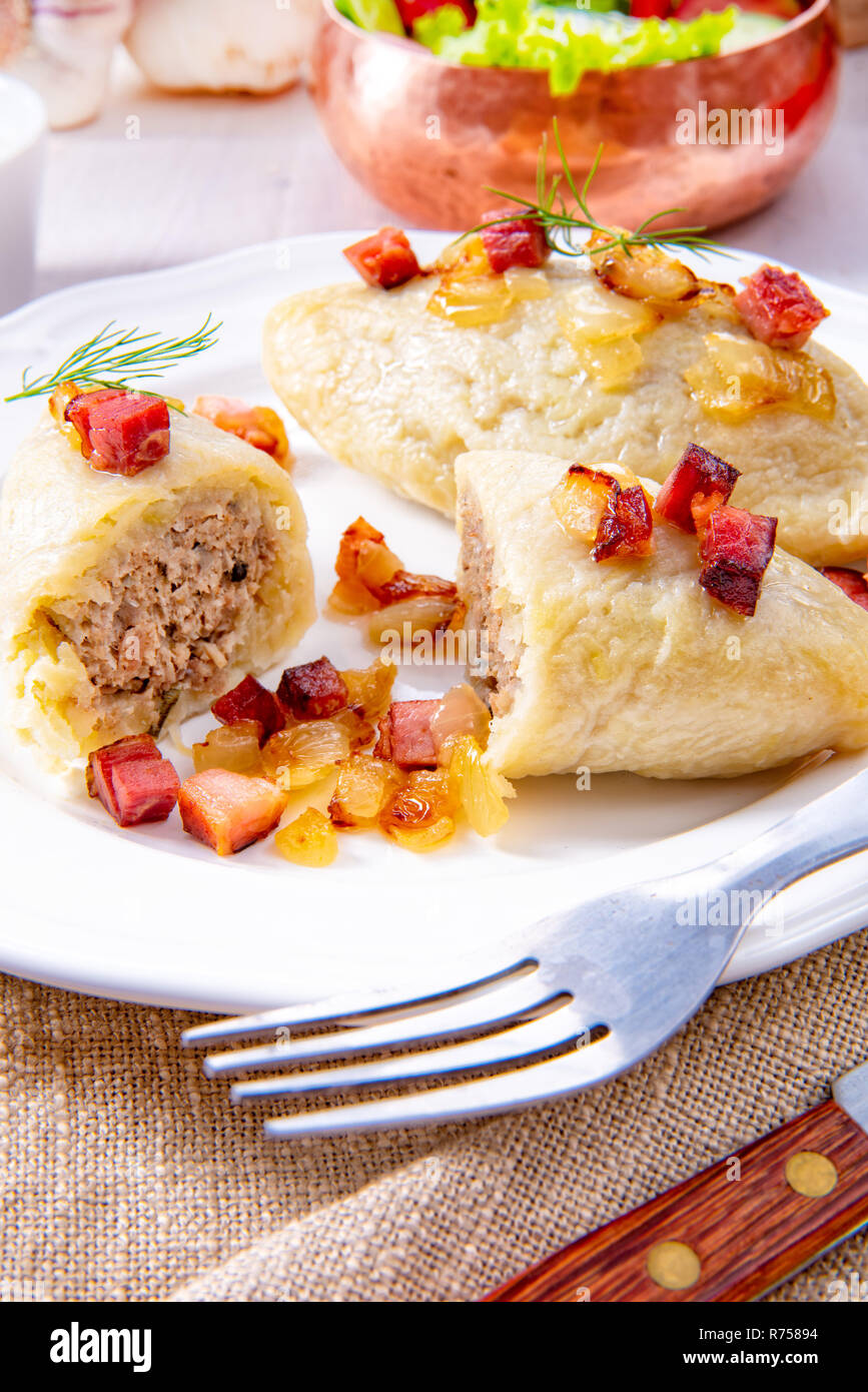 delicious cepelinai,a specialty lithuanian and polish cuisine. Stock Photo