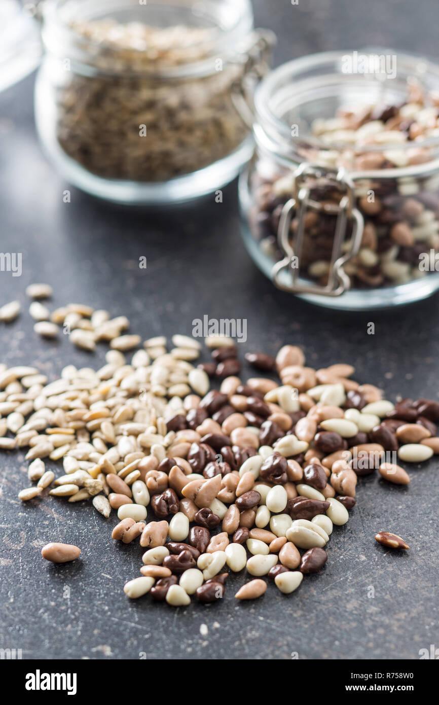 Chocolate covered sunflower seeds Stock Photo Alamy