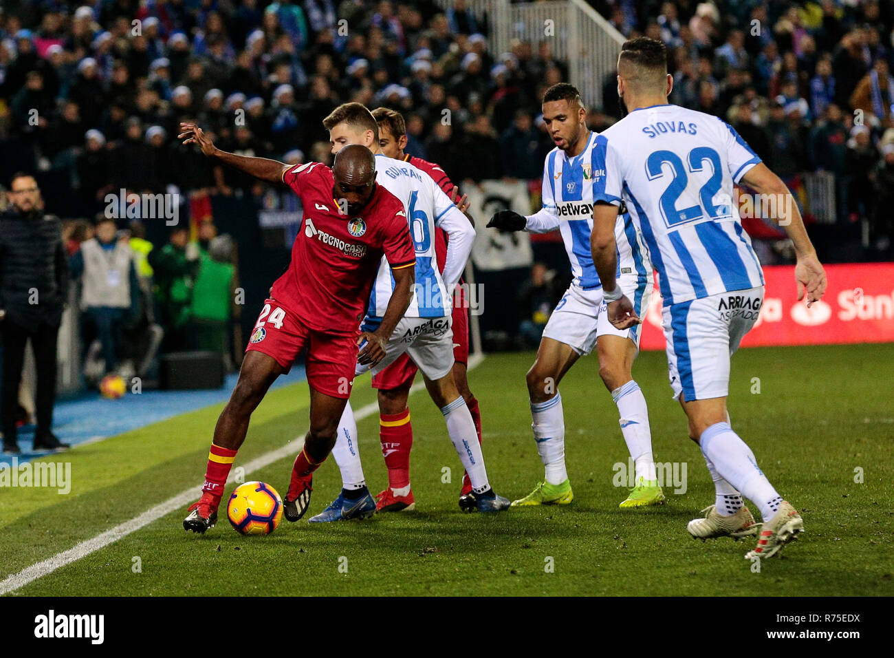CD Leganes's Jose Manuel Arnaiz and Getafe CF's Dimitri Foulquier fight for the ball during the La Liga match between CD Leganes and Getafe CF at Butarque Stadium in Leganes, Spain. (Final score: CD Leganes 1 - 1 Getafe CF) Stock Photo