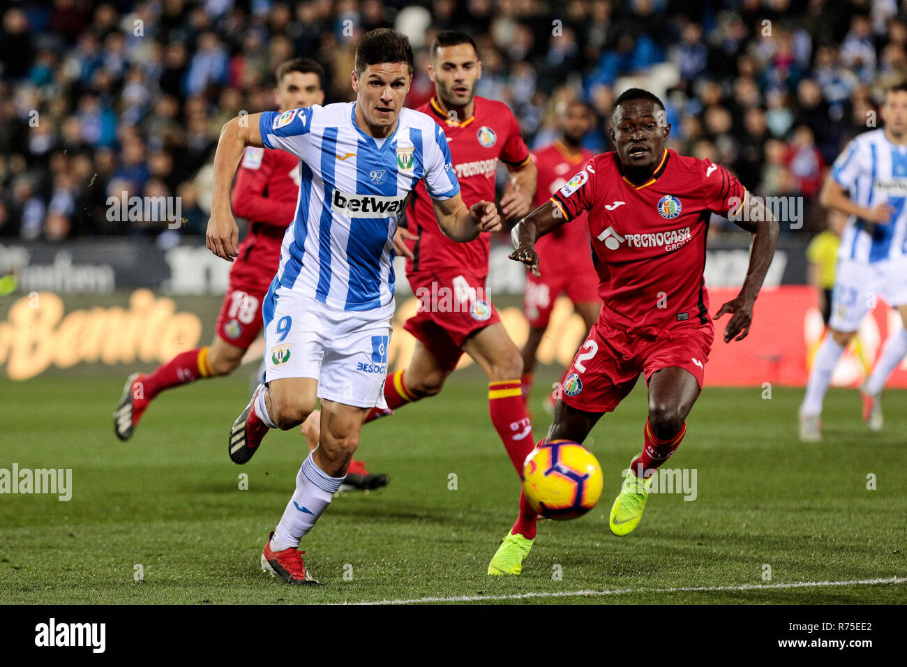 CD Leganes' Guido Marcelo Carrillo and Getafe CF's Djene Dakoman fight for the ball during the La Liga match between CD Leganes and Getafe CF at Butarque Stadium in Leganes, Spain. (Final score: CD Leganes 1 - 1 Getafe CF) Stock Photo