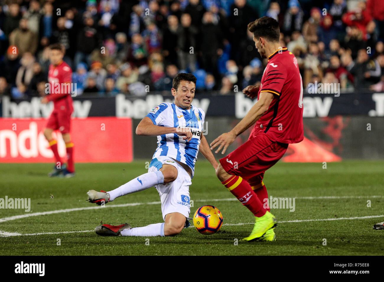 CD Leganes' Kenneth Josiah Omeruo and Getafe CF's Leandro Cabrera seen in action during the La Liga match between CD Leganes and Getafe CF at Butarque Stadium in Leganes, Spain. (Final score: CD Leganes 1 - 1 Getafe CF) Stock Photo