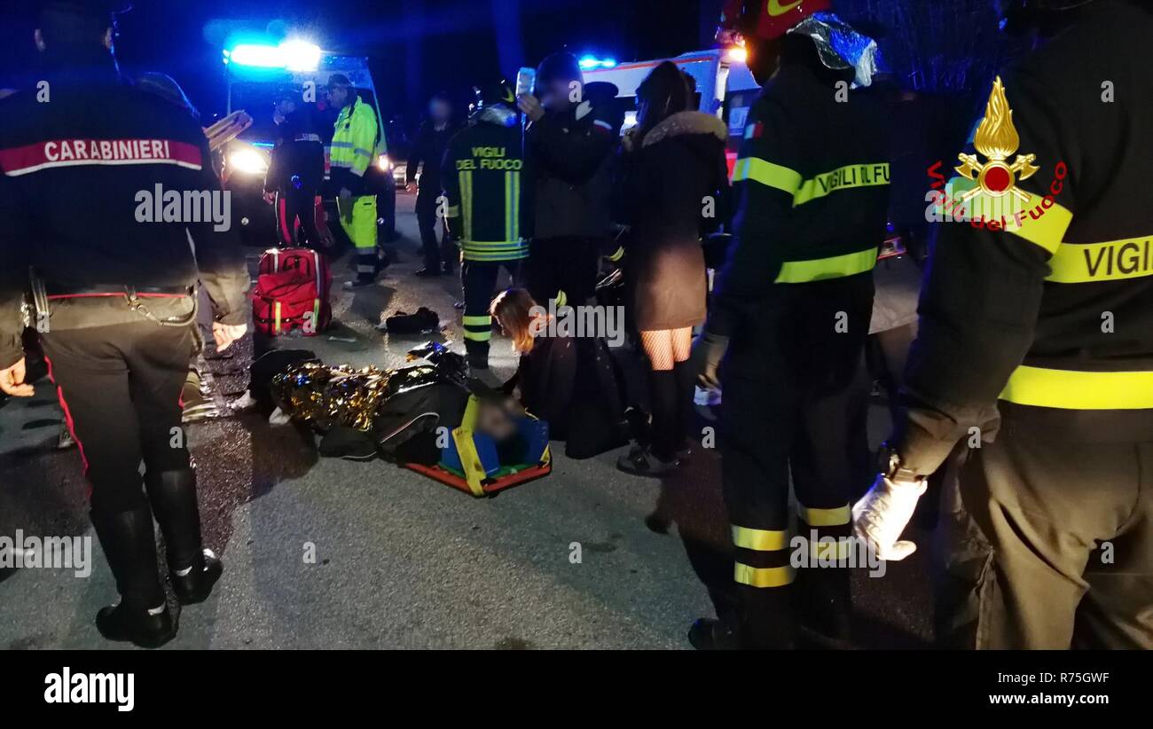 HANDOUT - Corinaldo, Italy, 08th December 2018. After a mass panic in a discotheque, rescue workers look after injured people. Early in the morning, several people lost their lives in the mass panic of visitors to a discotheque in Madonna del Piano in the municipality of Corinaldo near the Italian port of Ancona on the Adriatic Sea. Referring to the rescue services, it was said that about 100 people were also injured, about ten of them seriously. Credit: dpa picture alliance/Alamy Live News Stock Photo