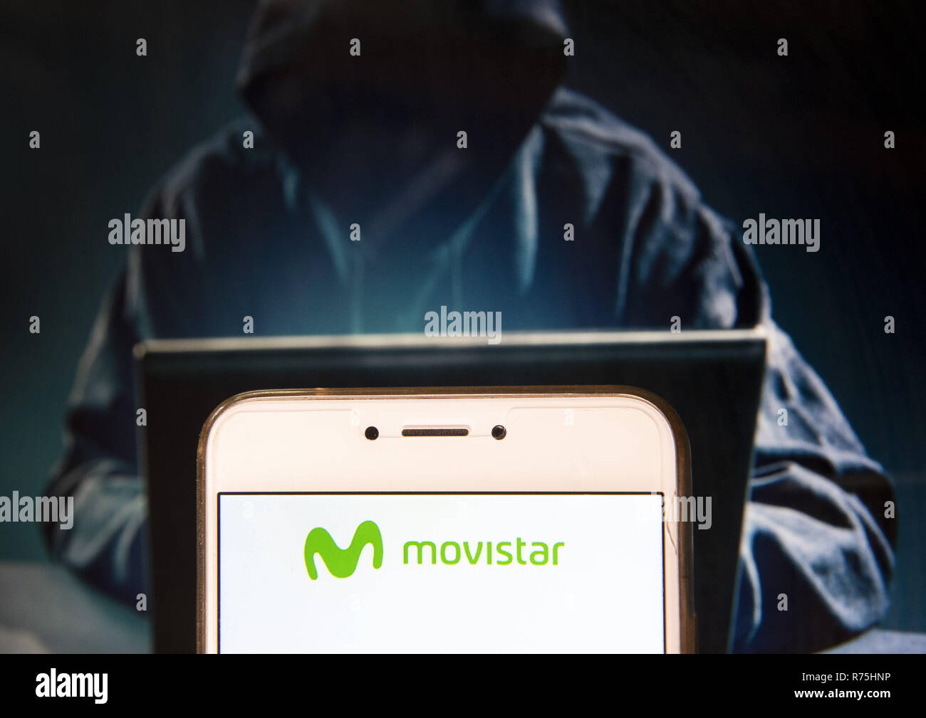Hong Kong. 23rd Nov, 2018. Spanish telecommunications brand owned by Telefonica and largest mobile phone operator, Movistar, logo is seen on an Android mobile device with a figure of hacker in the background. Credit: Miguel Candela/SOPA Images/ZUMA Wire/Alamy Live News Stock Photo