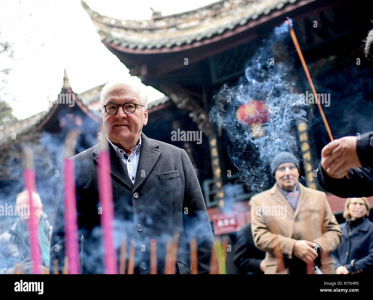 Dujiangyan, China. 08th Dec, 2018. Federal President Frank-Walter Steinmeier lights incense sticks in Erwang Temple. President Steinmeier is on a state visit to Dujiangyan on the occasion of a six-day trip to China. Credit: Britta Pedersen/dpa-Zentralbild/dpa/Alamy Live News Stock Photo