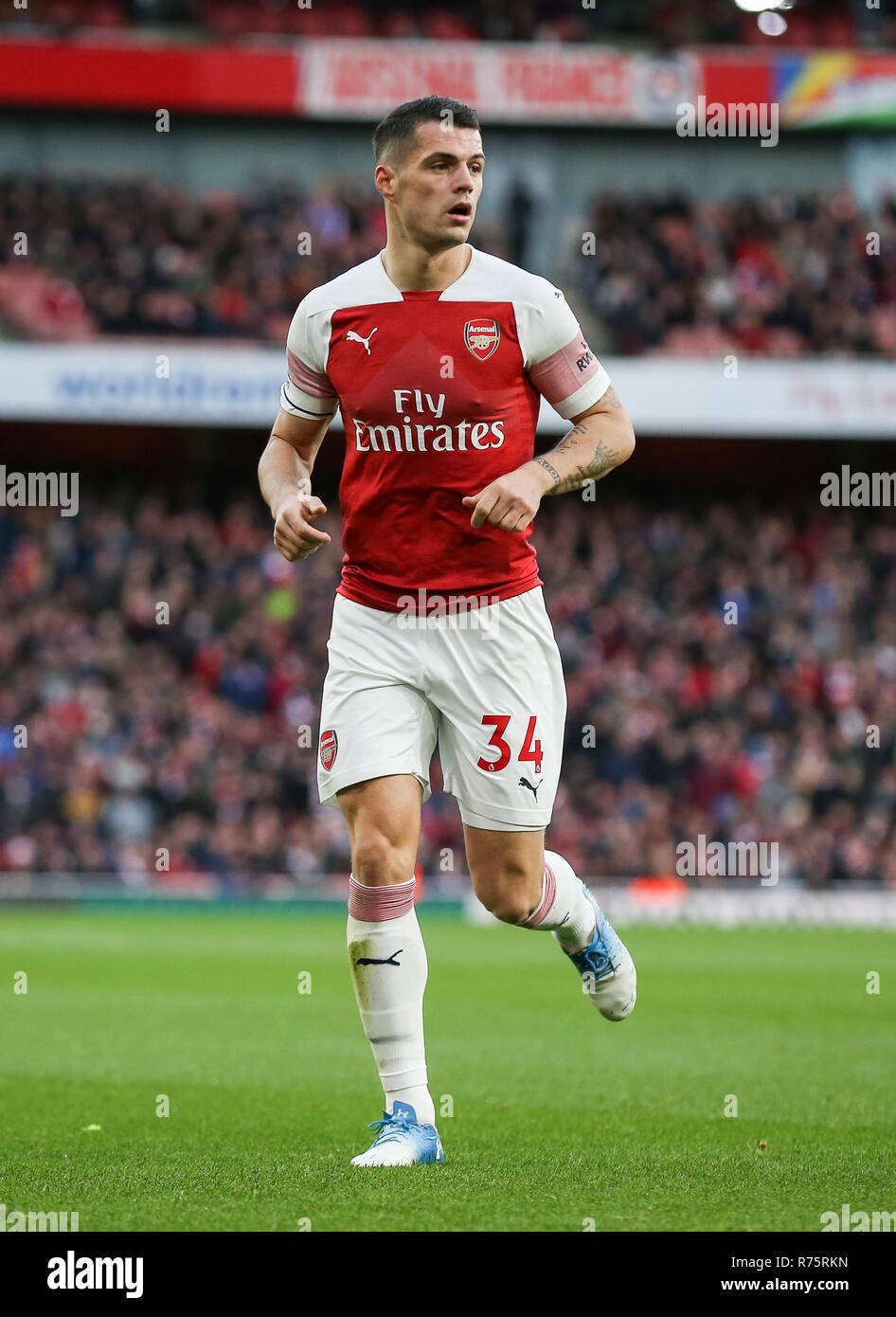 London, UK. 8th December 2018. Granit Xhaka of Arsenal during the Premier League match between Arsenal and Huddersfield Town at Emirates Stadium Editorial use only, licence required for commercial use. No use in betting, games or a single club/league/player publications.Credit: PHC Images/Alamy Live News Stock Photo