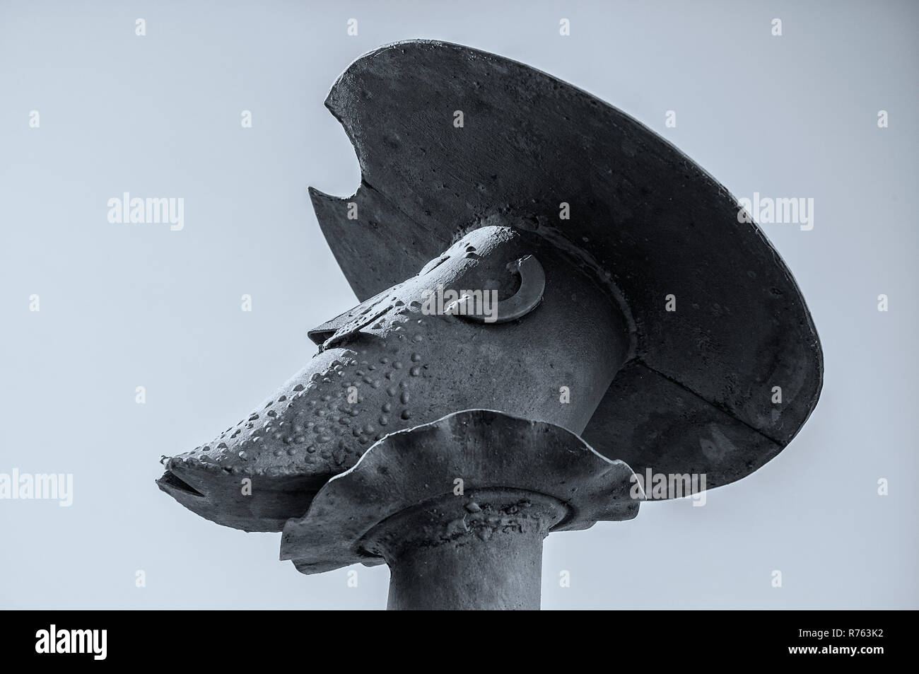 don quixote leather motorcycle helmet Don Quixote statue with Mambrino Helmet Stock Photo