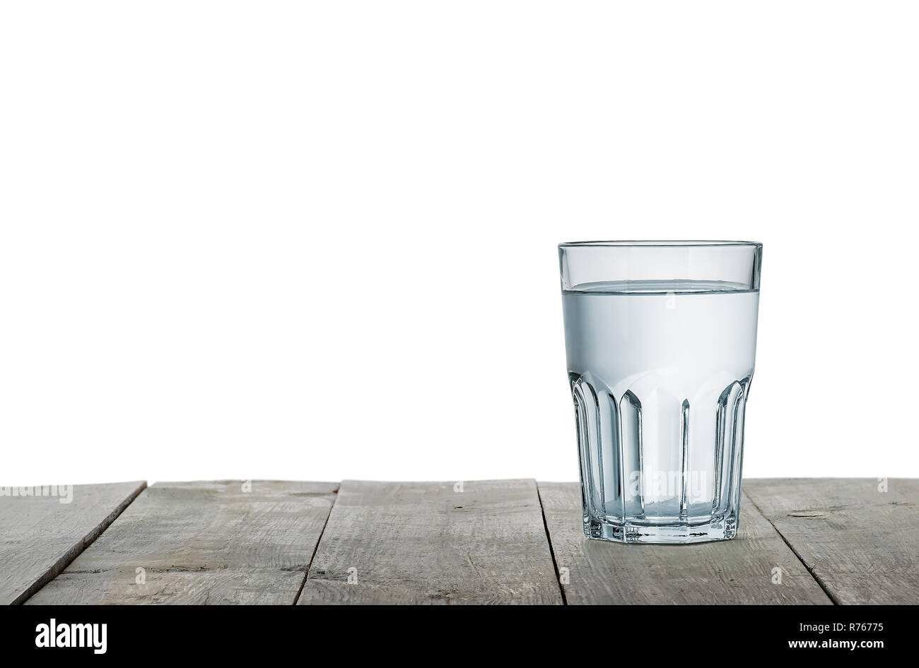 Glass of water on wooden table Stock Photo - Alamy