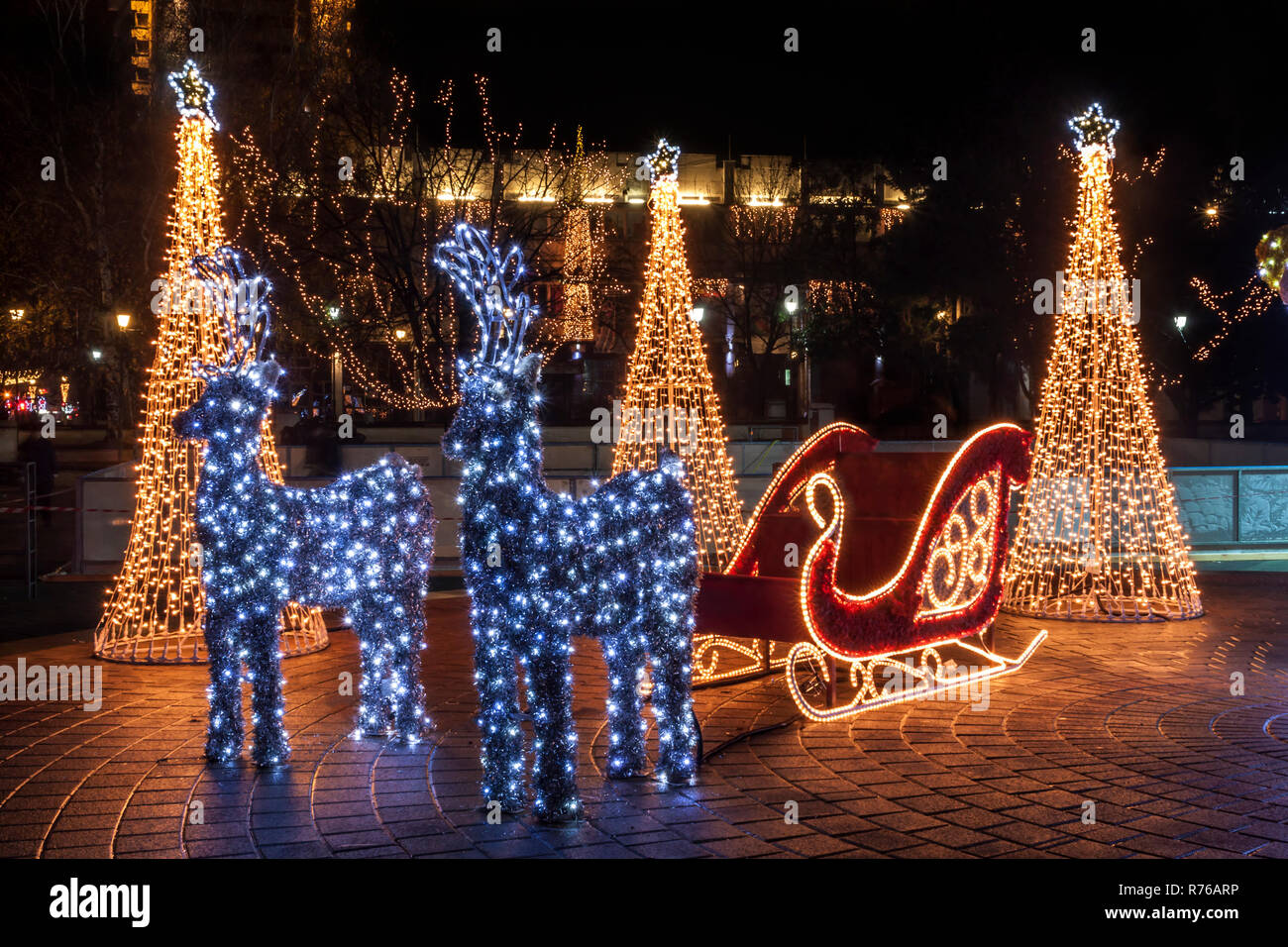 Santa Claus Sleigh And Two Reindeer Decorated With Lights Stock Photo -  Alamy Santa Claus Sleigh And Two Reindeer Decorated With Lights Stock Photo -  Alamy