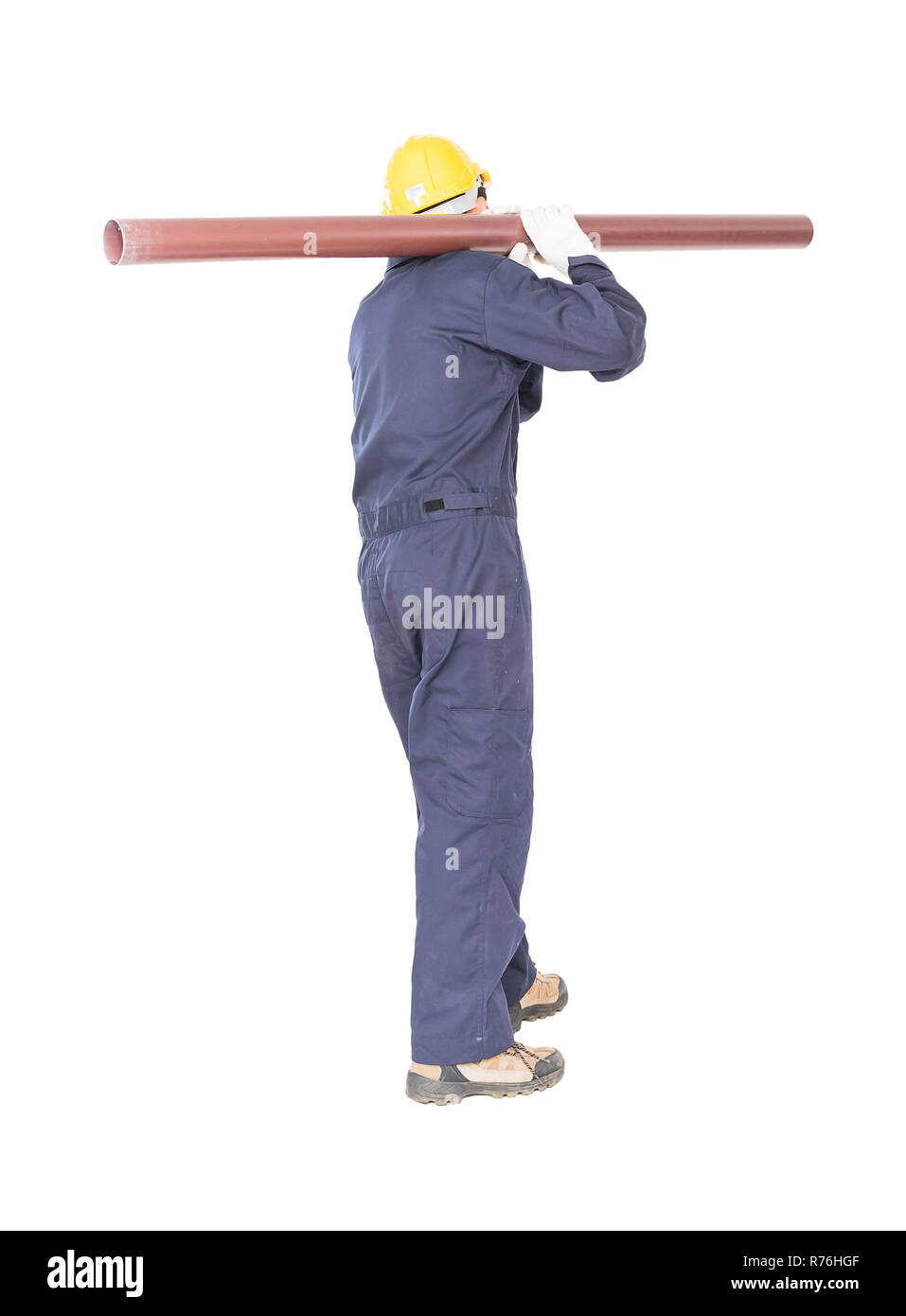 Young plumber holding pvc pipe Stock Photo Alamy