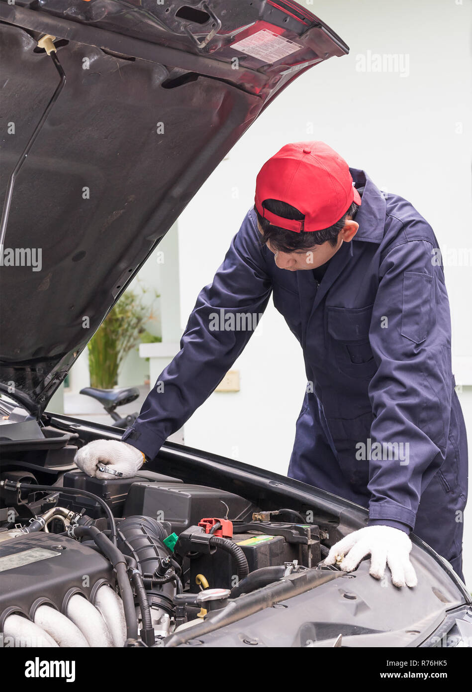 Auto mechanic check engine car Stock Photo Alamy