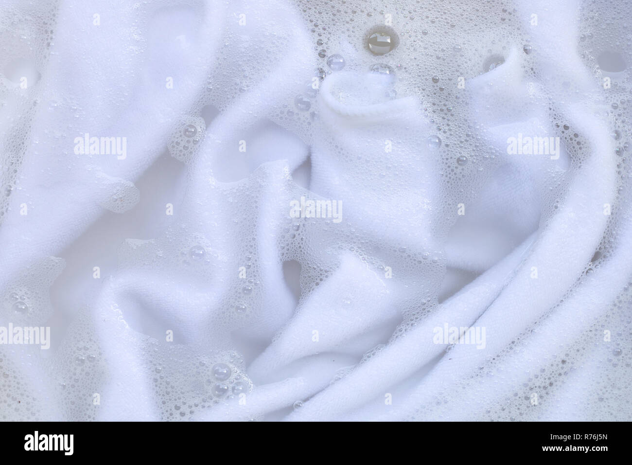 Washing clothes, white clothes soaked Stock Photo Alamy