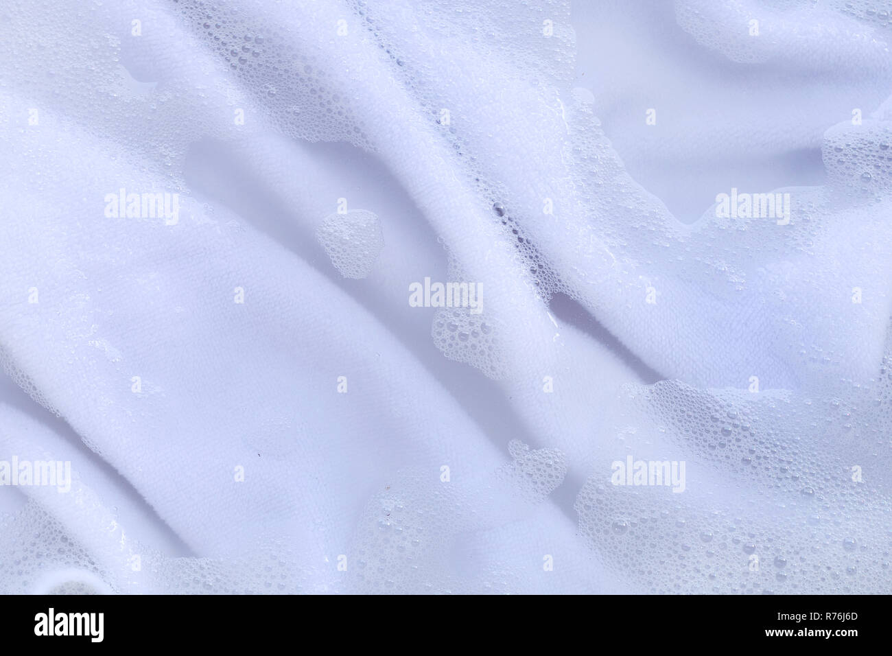 Washing clothes, white clothes soaked Stock Photo Alamy